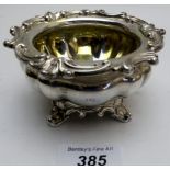 A Georgian silver salt with scroll edge and scroll feet, 5.