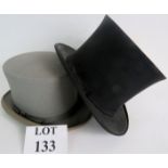 Two top hats, size 7 1/2, one in black silk, collapsible,