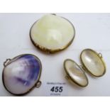 A collection of three shell trinket boxes,