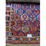 A tribal mountain Bachtiar rug, mid 20th century, colourful panel design,