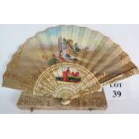 A highly decorative fan, painted and with gilt highlights, comes with original box, signed,