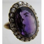 An amethyst and diamond ring, amethyst approx 12mm x 18mm, size N, boxed,