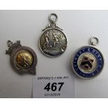 Three silver fobs including two football, all fully hallmarked,