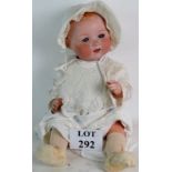 An early 20th century Armand Marseille bisque head baby doll, `351 / 10K`,