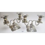 A pair of silver two branch candelabra's, approx 7" high, London 1892, approx 38 troy oz/1170 grams,