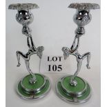 A pair of candlesticks, Art Deco style with a chrome look finish and inset green bases, 20cm tall,