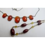 A vintage amber necklace and a cornelian necklace,