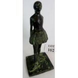 A bronze sculpture of a young ballerina reminiscent of the style of a Degas figure, 35cm tall,