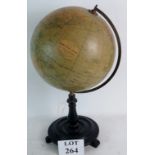 A Philips 12" Terrestrial Globe, on ebonised wooden stand, 57cm high,