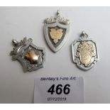 Three silver fobs including one Chester hallmarked, all fully hallmarked,