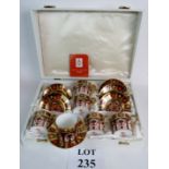 Cased Royal Crown Derby coffee set, six cans and saucers, in as new condition,