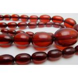 A graduated (possibly cherry amber) necklace,