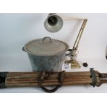 A zinc coated pail with lid, a surveyor's tripod,