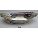 A silver boat shaped dish with pierced decoration, Sheffield 1899, approx 6.
