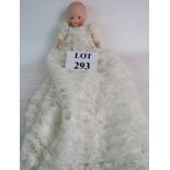 An early 20th century Armand Marseille bisque head baby doll in Christening dress,