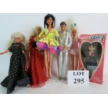 Three Mattel Barbie dolls, a Mattel Ken doll, a Hasbro doll, and a boxed Matchbox Ginny doll,