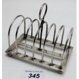A Victorian silver toast rack, London 1881, approx 3.