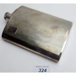 A silver plated hip flask with engine turned decoration,