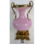 An ornate Classical-Revival gilt-metal mounted pink glass urn form vase, 33cm high,