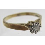 A 9ct gold diamond solitaire ring, approx 0.