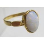 A 22ct gold opal set ring, size S,