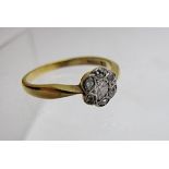 An 18ct gold diamond cluster ring, approx 0.