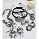 A collection of costume jewellery to include a fully hallmarked silver bangle,