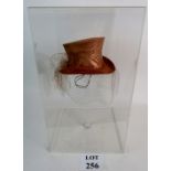 A stylish ladies dress hat kept box fresh in its own perspex case, Stephen Jones for Liberty,