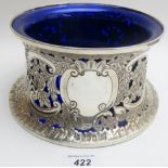 An Irish silver dish ring/potato ring, heavily embossed with Chinese figures, birds, and flowers,