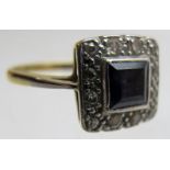 An 18ct gold and platinum Art Deco sapphire and diamond ring, size P,