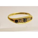 An 18ct gold sapphire and diamond ring, size M,