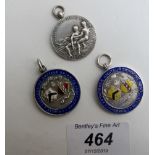 A collection of three silver swing associated fobs, two of which are enamelled ,