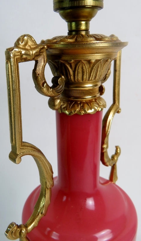 An ornate Classical-Revival gilt-metal and pink glass table lamp, 40cm high, - Image 2 of 3