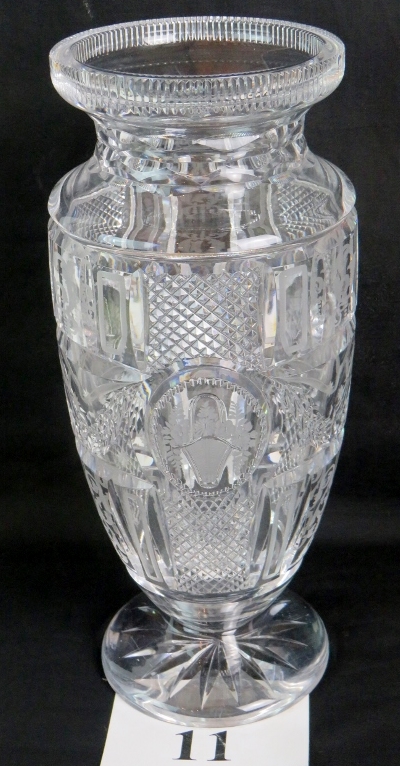 A good quality late 19th/early 20th century cut-glass vase, with engraved decoration, 33cm high,