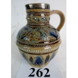 A Doulton Lambeth Stoneware Art Pottery single-handled jug, dated 1874, inscribed white metal rim,