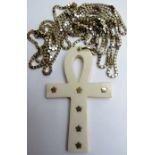 An ivory Ankh 'Symbol of Life' on a metal chain est: £30-£50