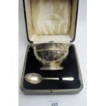A silver christening bowl and spoon, Birmingham 1934/1935, boxed, approx 4 troy oz/130 grams,