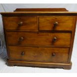 A Victorian Cuban mahogany chest of 2 short over 2 long drawers with turned handles,