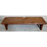 A small carved oak footstool,