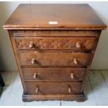A small 20th oak bedside chest with 4 drawers,