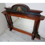 A Victorian mahogany overmantle mirror with painted highlights and a bevelled edge mirror,