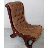 A Victorian deep buttoned low chair/stool,