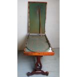 A Victorian mahogany bagatelle board on an associated base, slightly a/f,