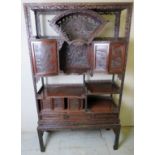 Early 20th century Chinese carved display cabinet with carved doors depicting birds,