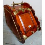 A 19th century Aesthetic period walnut coal scuttle, with brass mounts,
