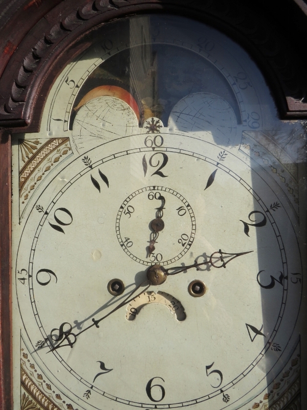 A 19th century carved oak 8 day longcase clock with painted arched moon phase dial and complete - Image 2 of 2