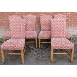 A set of six 20th century walnut framed high back dining chairs upholstered in a pastel red