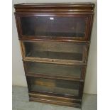 A Globe Wernicke 4 section oak bookcase bearing label,