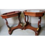 A pair mid 19th century mahogany jardiniere stands, one with a timer, each with gilded ram supports,