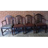 A set of four good quality Hepplewhite design mahogany dining chairs upholstered in tan leather